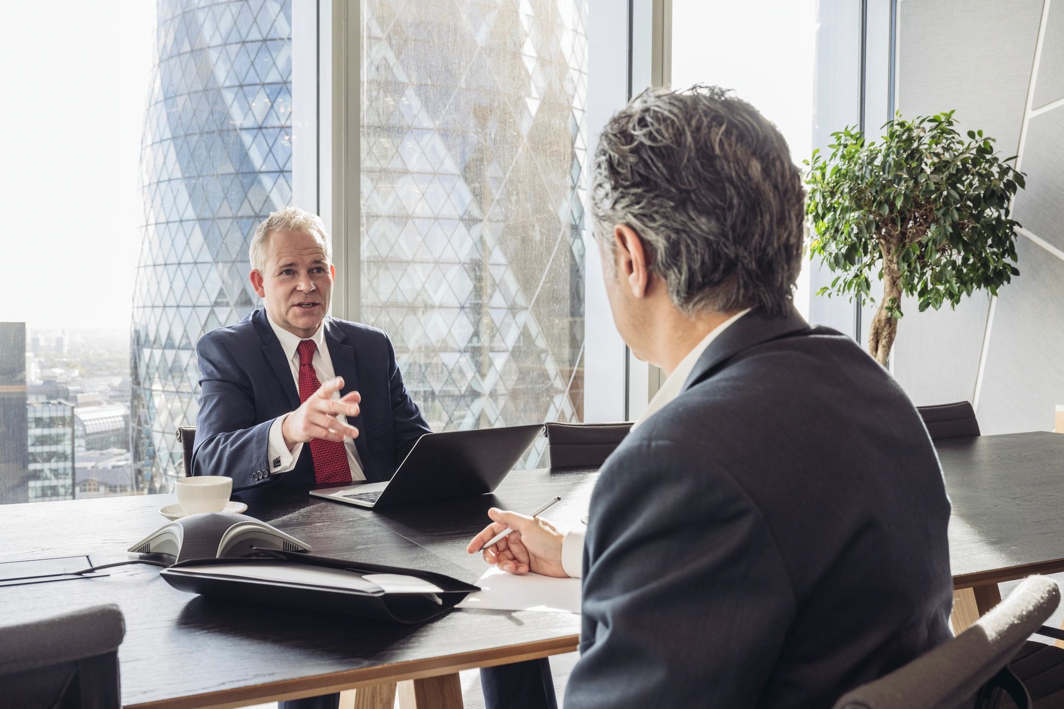 IT security specialist meeting with a business owner